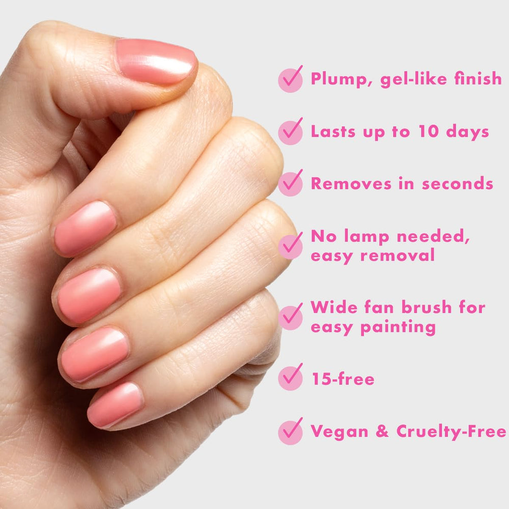 Olive & June applying polish on a nail illustrating even strokes and neat edges