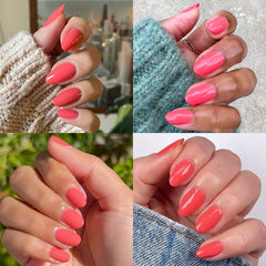 Olive & June painted hand applying color for neat lines and salon-quality results