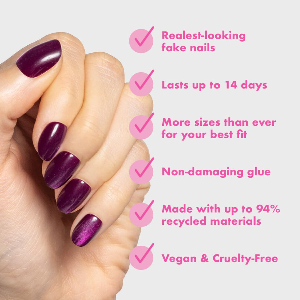 Olive & June nails held in hand showing scale and natural appearance