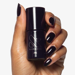 Olive & June pedicure application of Plum Purple SD showing durable, chip-resistant shine