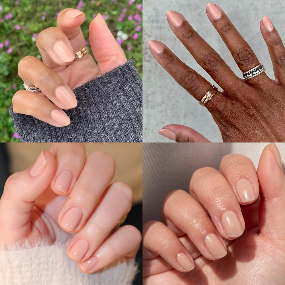 Hand wearing Olive & June polish in lifestyle setting showing durable, glossy results