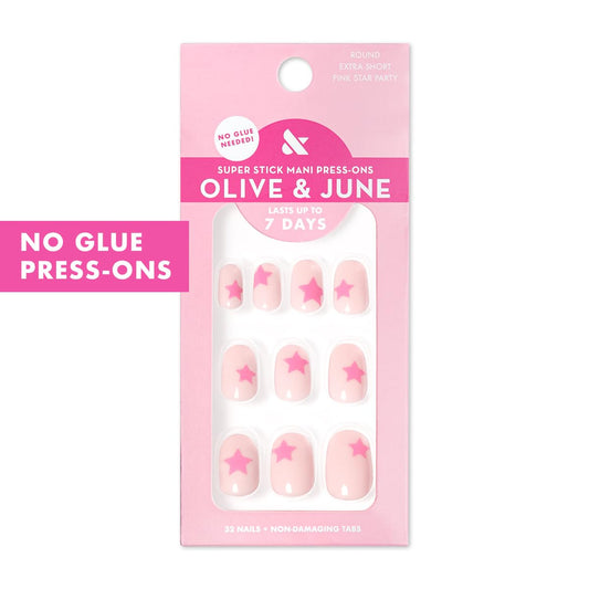 olive & june press-on nails spread out showing 32 nails and sizes for perfect fit