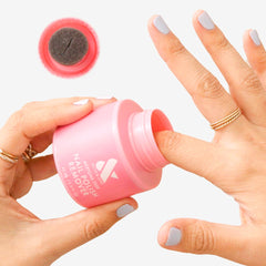 Olive & June lid detail showing soft sponge top for easy toe polish removal benefit