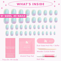 Olive & June press-on nail next to coin for size and scale clarity