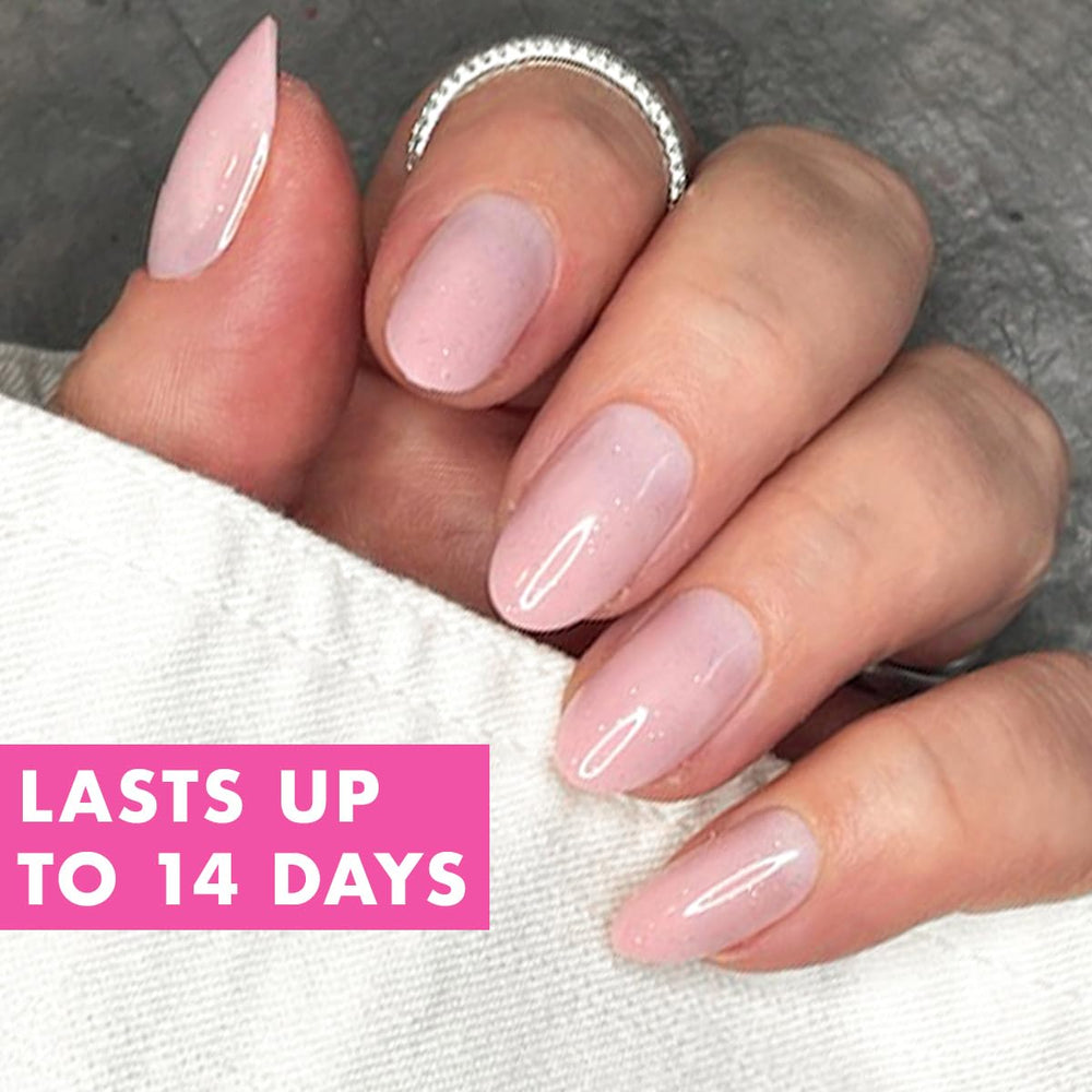 Olive & June hand showing nail length and scale benefit: medium oval fit for everyday wear