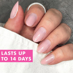 Olive & June hand showing nail length and scale benefit: medium oval fit for everyday wear