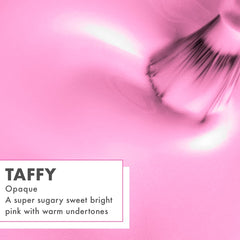 Olive & June swatches on fingertips showing true taffy pink payoff