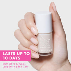 Olive & June wide fan brush spreading polish for smooth application