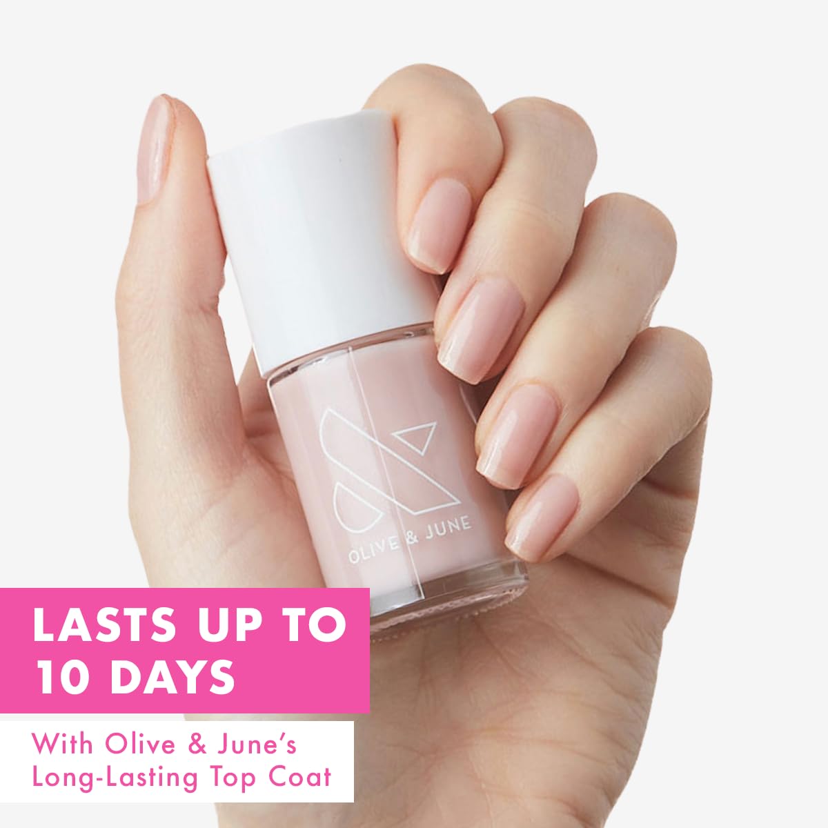 Olive & June wide brush fanning across nail for smoother application benefit
