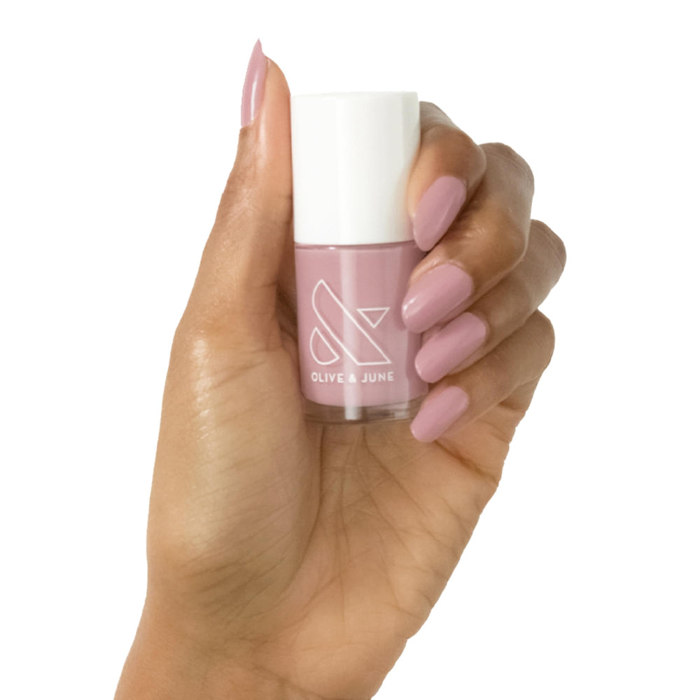 Olive & June front bottle showing World Lit mauve and glossy finish
