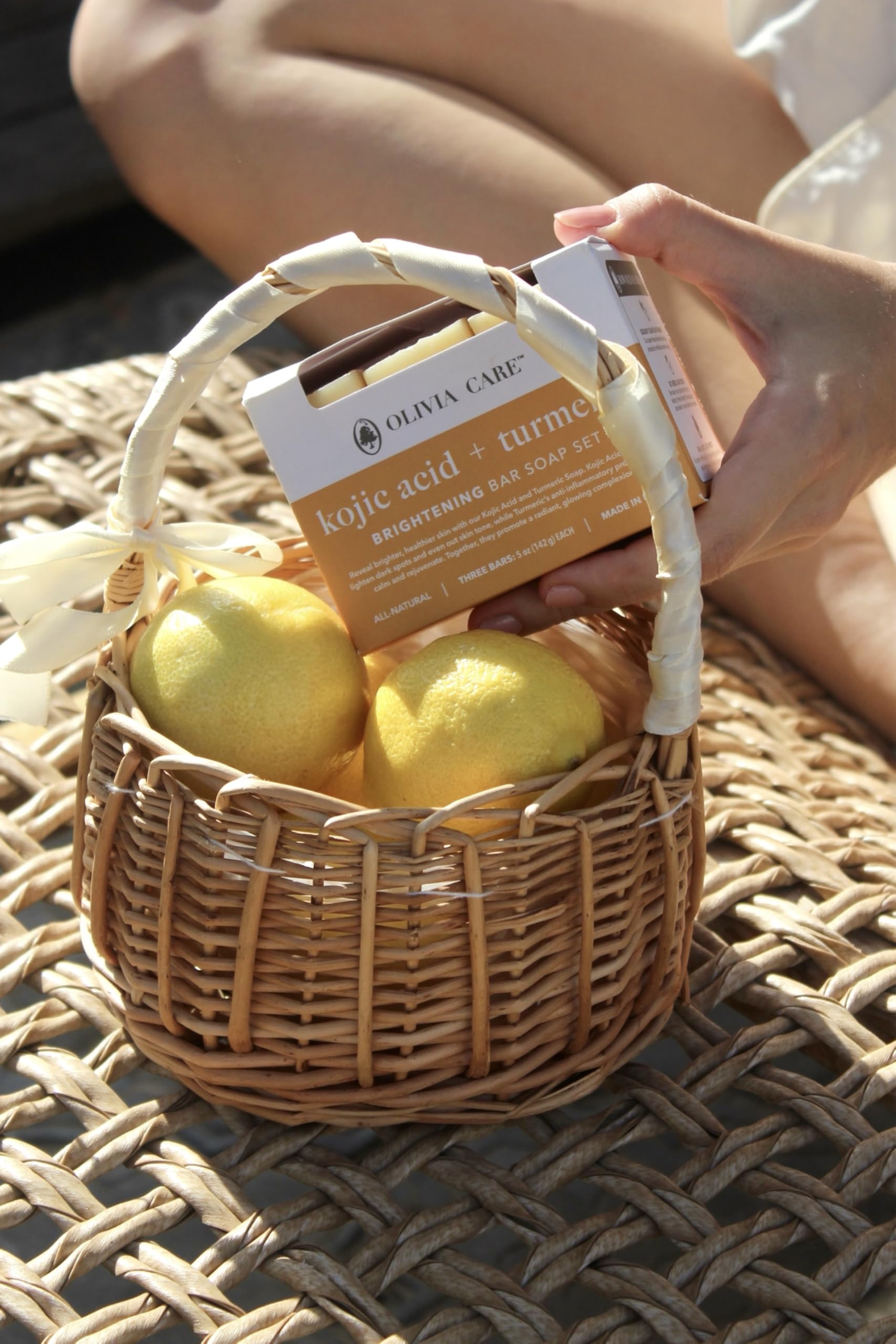 Olivia Care ingredients label closeup showing kojic acid, turmeric, olive oil benefits