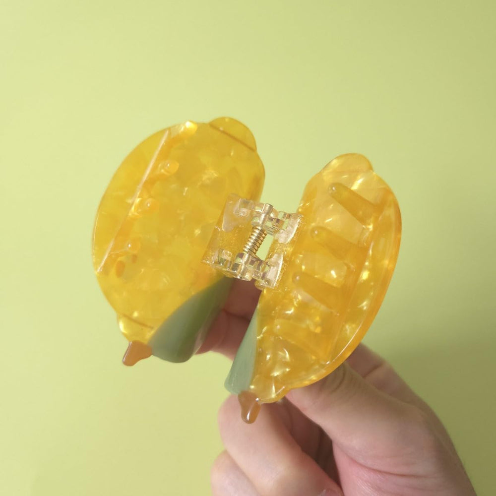 OMG Decor lemon claw clip teeth closeup displaying double-row grip for secure hold