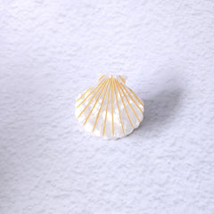 OMG Decor white shell claw clip texture closeup showing acetate fiber sheen
