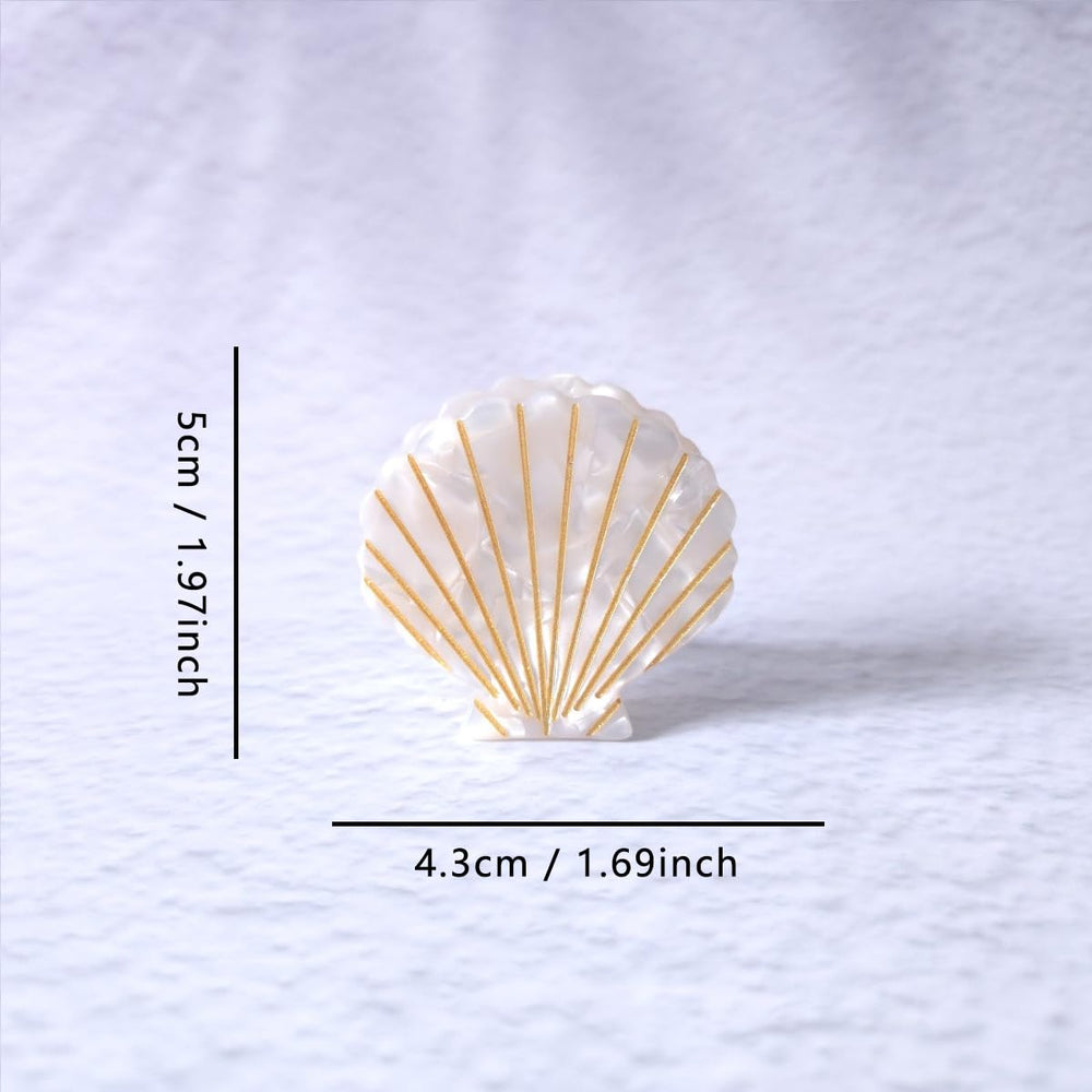 OMG Decor white shell claw clip side detail highlighting secure alloy spring