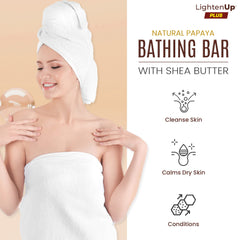 OMIC Lighten-Up lathered soap in hand demonstrating gentle exfoliation