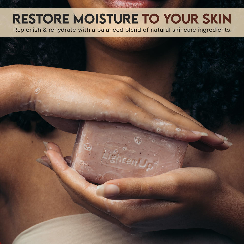 OMIC Lighten-Up lather in hand illustrating gentle exfoliation