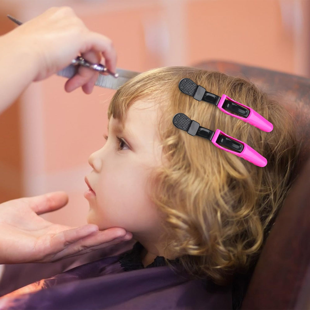Ondder black and pink clips arranged, color-coding speeds up salon organization benefit