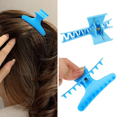 Ondder clip holding hair in place for precise styling and coloring