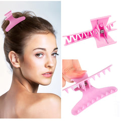 Ondder clip in use by stylist holding hair neatly