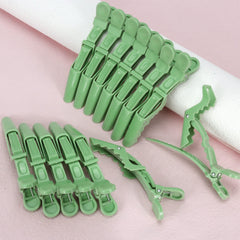 Ondder clips on bathroom counter holding hair back during makeup for multitasking