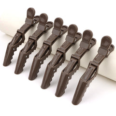 Ondder clip holding hair back during makeup application for neat routine