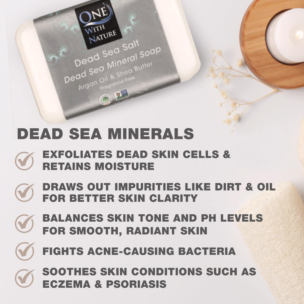 Close-up texture of One With Nature soap bar showing Dead Sea salt crystals and creamy lather