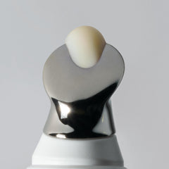 oneskin lip spf label closeup highlighting antioxidants benefit: helps neutralize free radicals