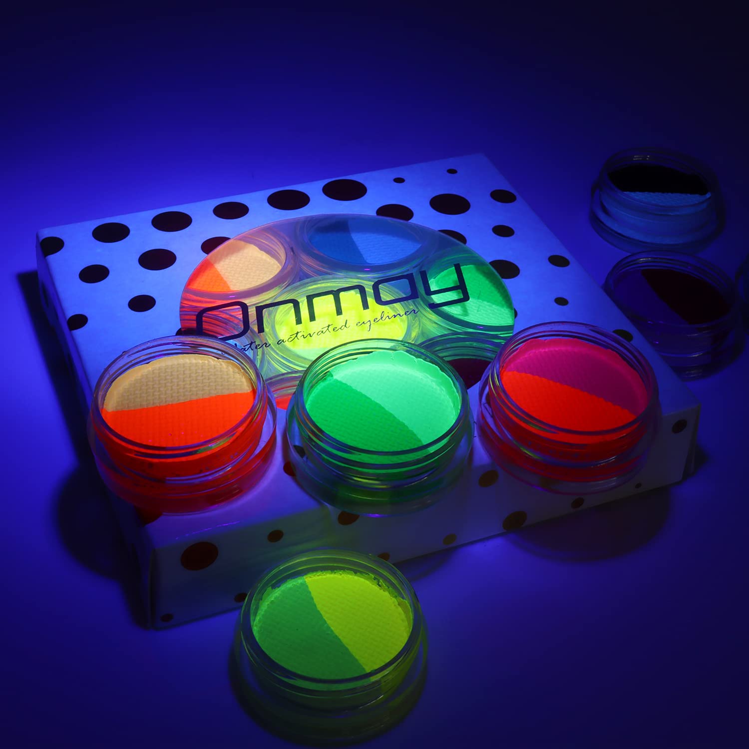 ONMAY palette next to hand to show compact size and easy portability
