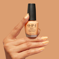 OPI applied on nails in studio lighting demonstrating high-shine, chip resistance benefit