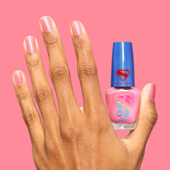 OPI bottle with coin for scale showing compact size and travel friendly benefit