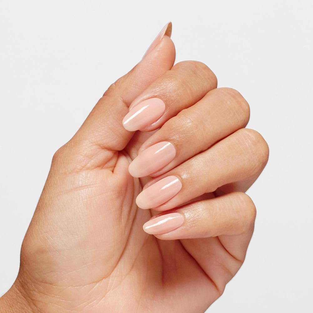 OPI polish on nails beside ruler showing size and precise coverage