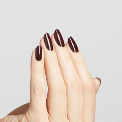 OPI Complimentary Wine swatch on nails highlighting deep color and salon shine