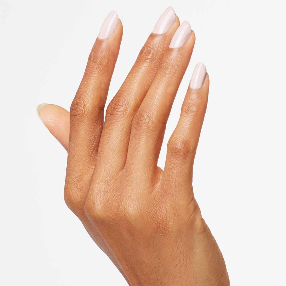 Hand model wearing OPI polish showing natural nude manicure benefit