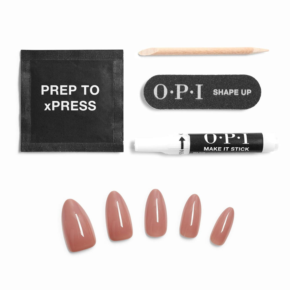 OPI lifestyle image of woman typing, showcasing durable press-on nails