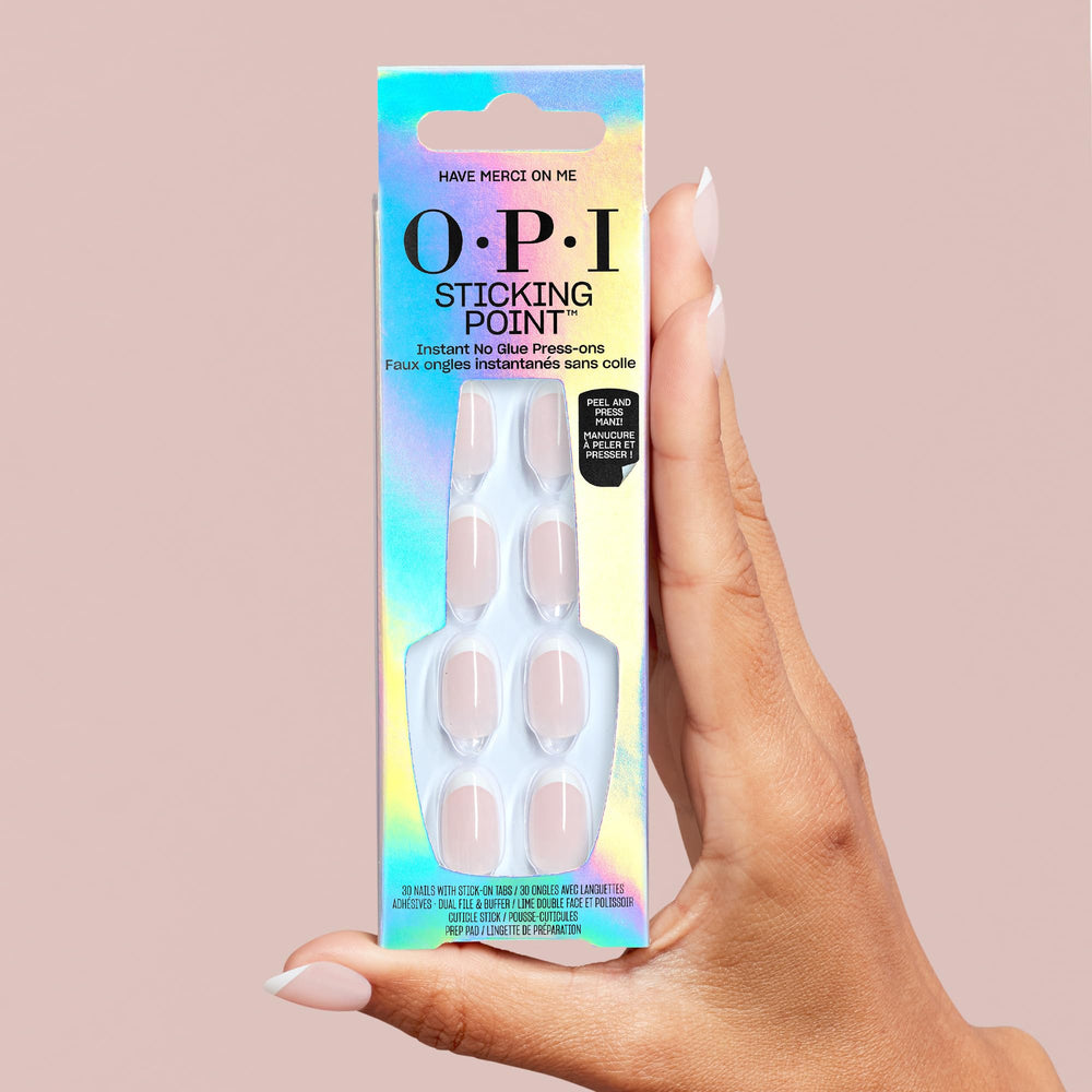 OPI worn on hands in lifestyle scene showcasing elegant French tips for everyday chic