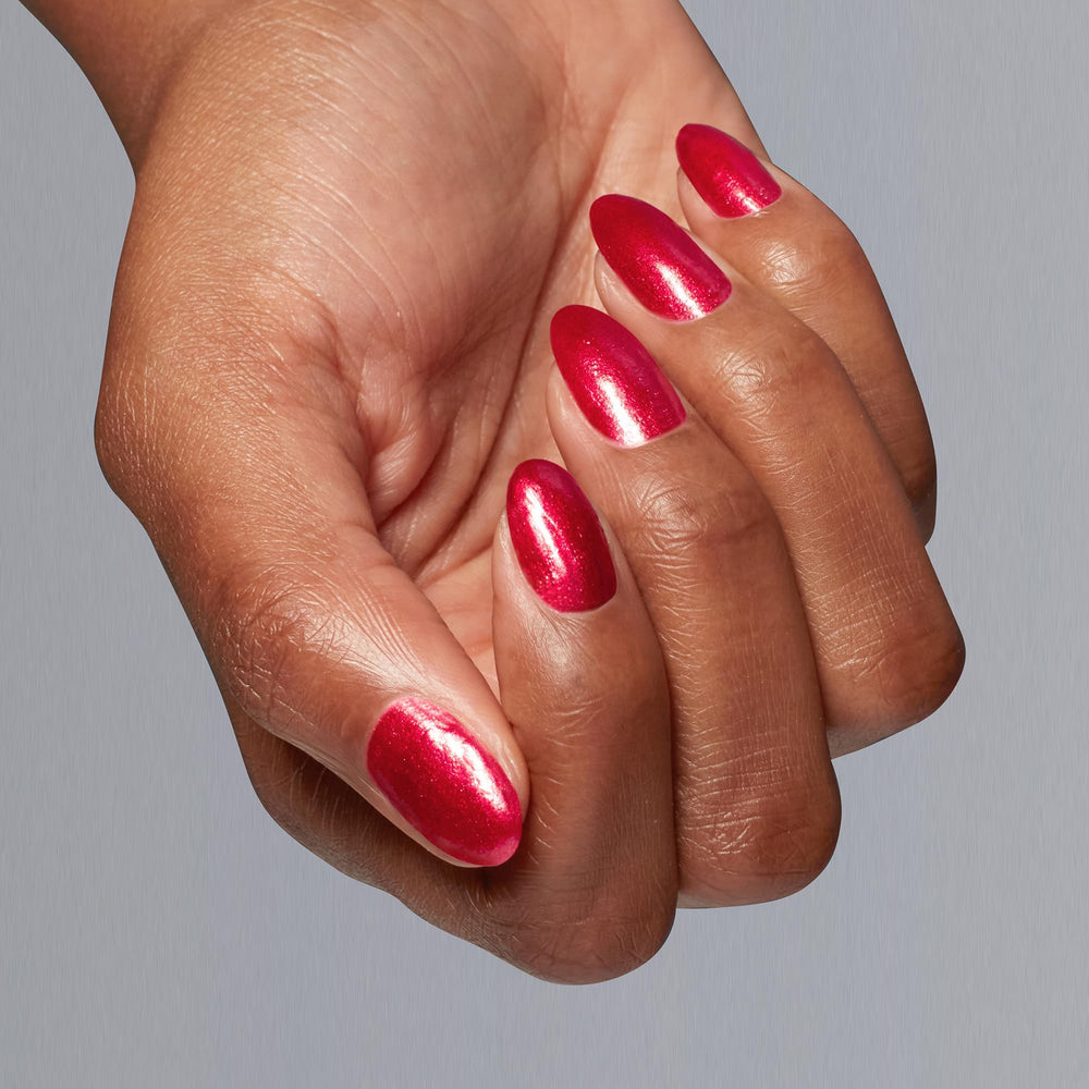 OPI on hand model in lifestyle setting showcasing vibrant manicure impact