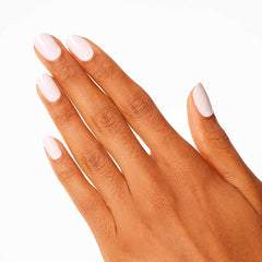 OPI painted nails in a salon setting demonstrating chip-resistant shine