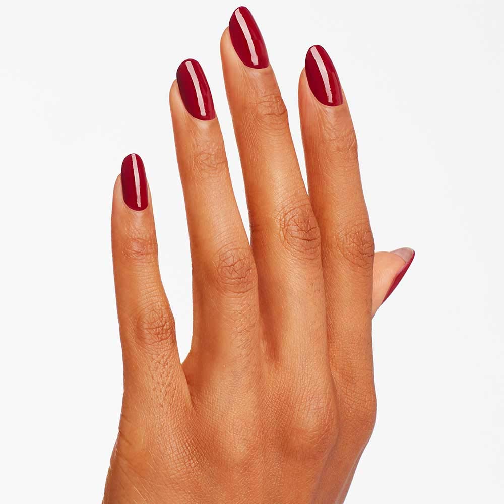 OPI Malaga Wine painted nails in studio lighting showing salon-quality gloss