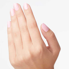 Hand applying OPI Mod About You showing streak-free finish and salon look benefit