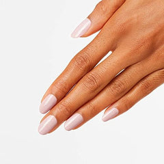 OPI Movie Buff swatch on hand showing true pale pink-beige tint