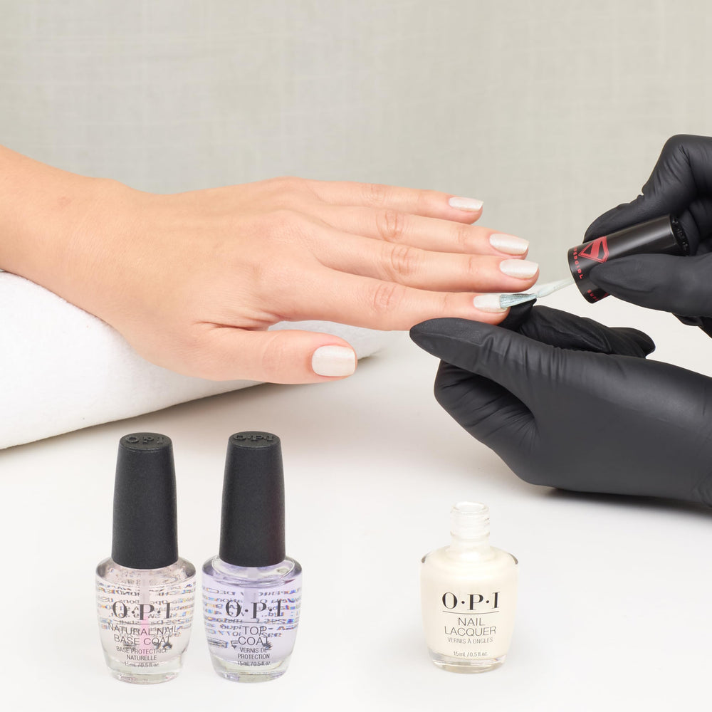 Manicure scene with OPI My Kryptonite and tools showing salon-quality routine