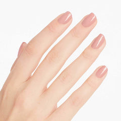 close-up nails with two coats of OPI soft pink showing chip resistance benefit
