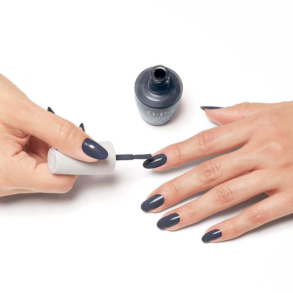 OPI manicured hand outdoors showing versatile style and eco-conscious benefit