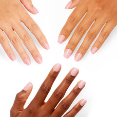 OPI nails being pressed on natural nails demonstrating fast application and neat fit