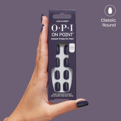 OPI less is norse lifestyle flatlay with nails and accessories suggesting quick at-home salon results