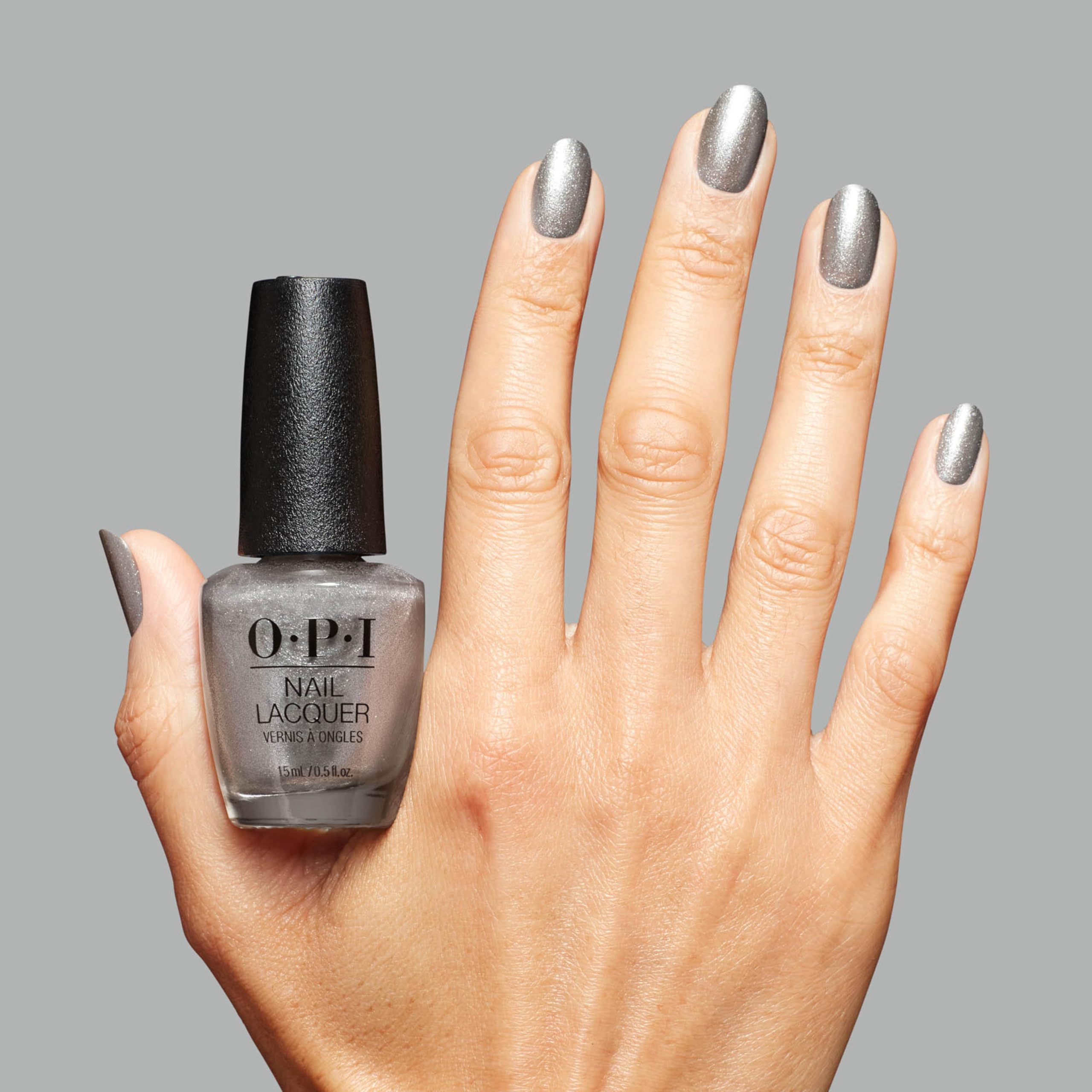OPI OPI’m Frosted bottle next to ruler for size comparison and travel-friendly benefit
