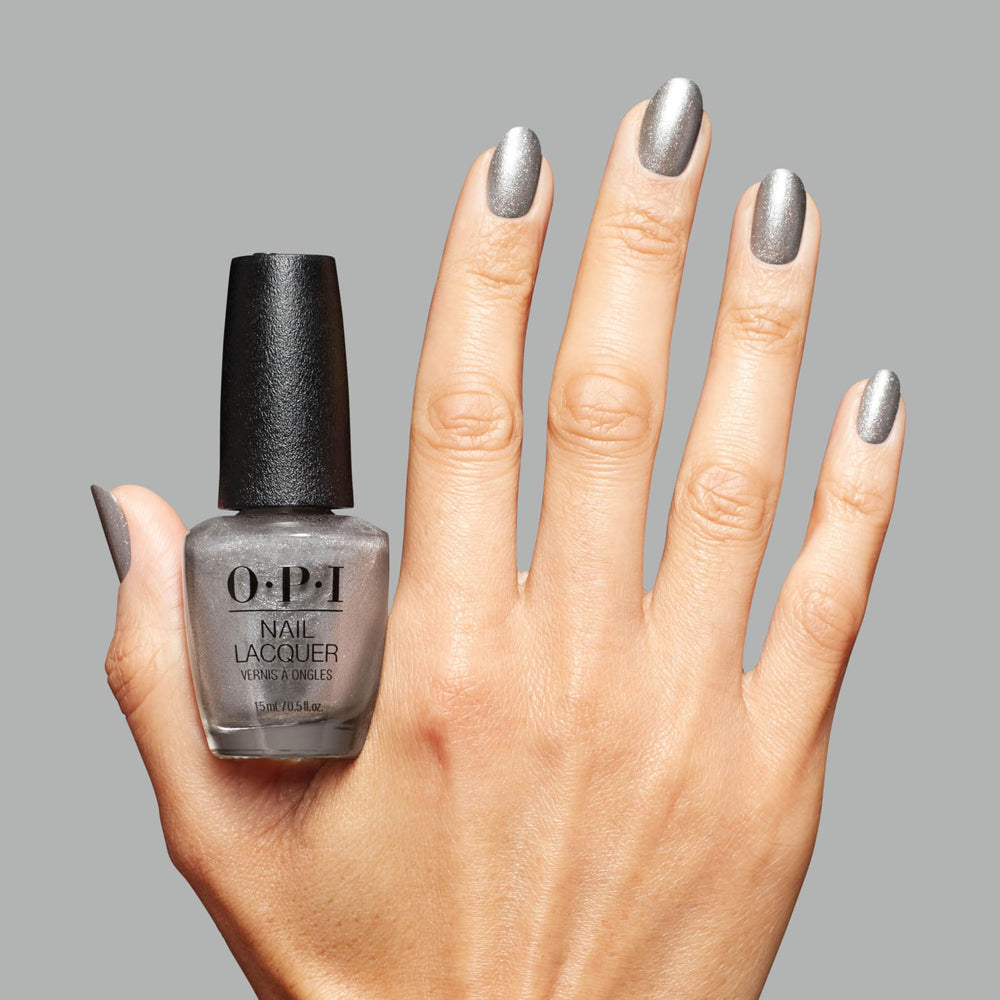 OPI OPI’m Frosted bottle next to ruler for size comparison and travel-friendly benefit