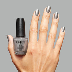 OPI OPI’m Frosted bottle next to ruler for size comparison and travel-friendly benefit