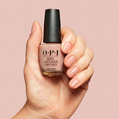OPI bottle cap and label detail showing brand and travel-ready size benefit