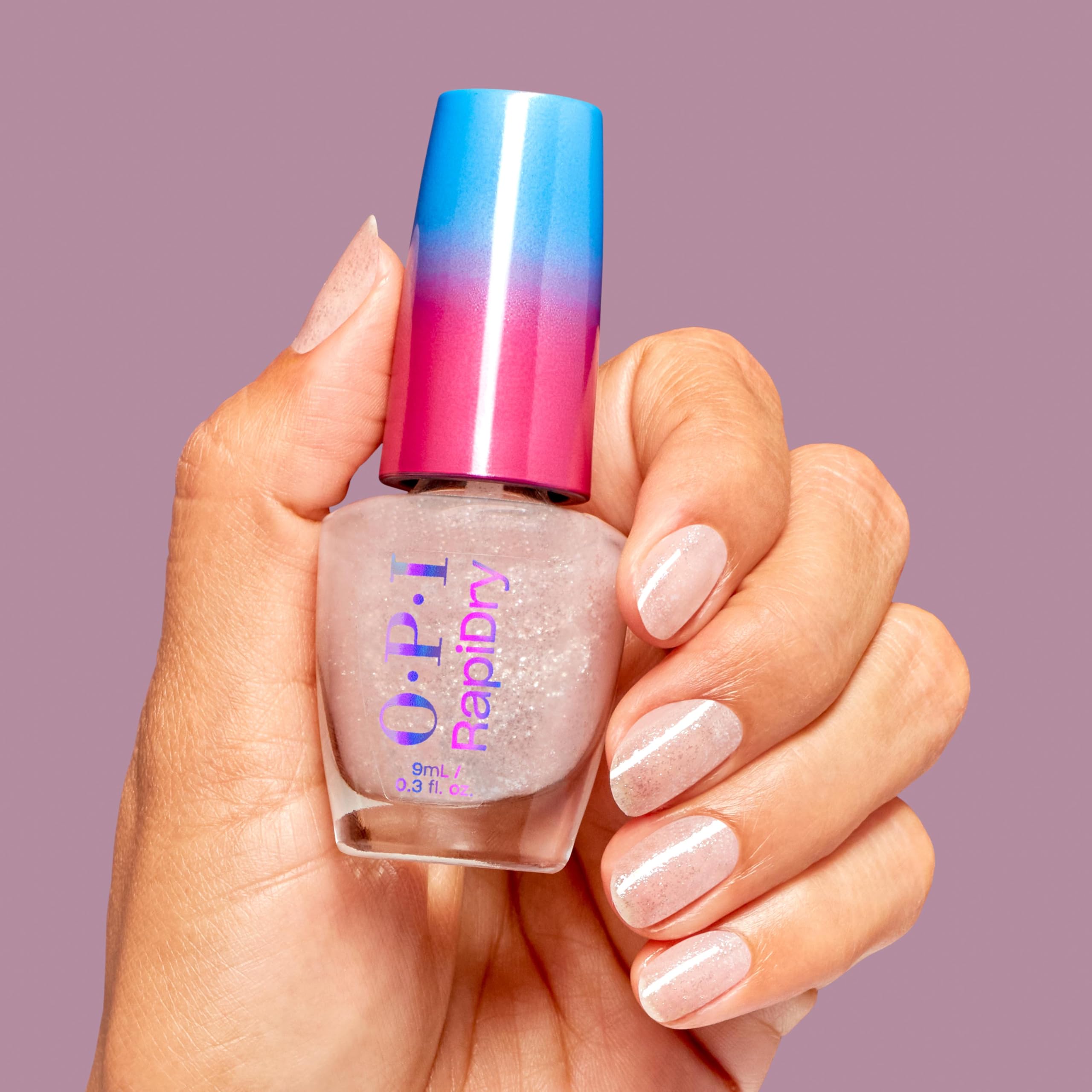 OPI manicure on hands in lifestyle scene illustrating quick-dry convenience benefit